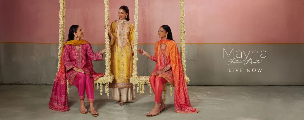 1. Model wearing an elegant Farah Talib Aziz formal dress with detailed embroidery.