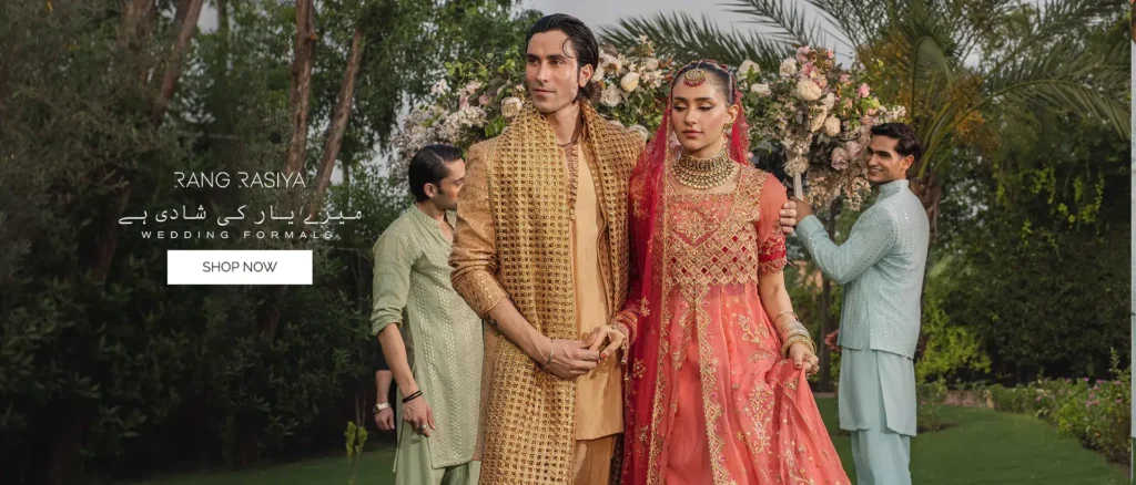 Detailed view of intricate silver thread embroidery on a premium lawn fabric dress.