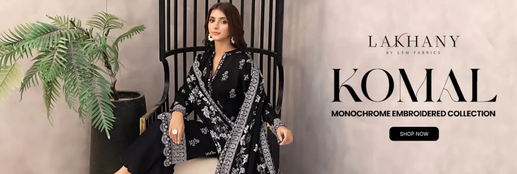 Mannequins in Lakhany lawn suits with signature prints at a boutique’s entrance.