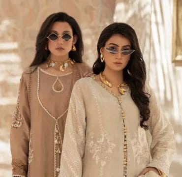 Detailed view of Shiza Hassan's fabric, featuring delicate threadwork, sequins, and luxurious textures.