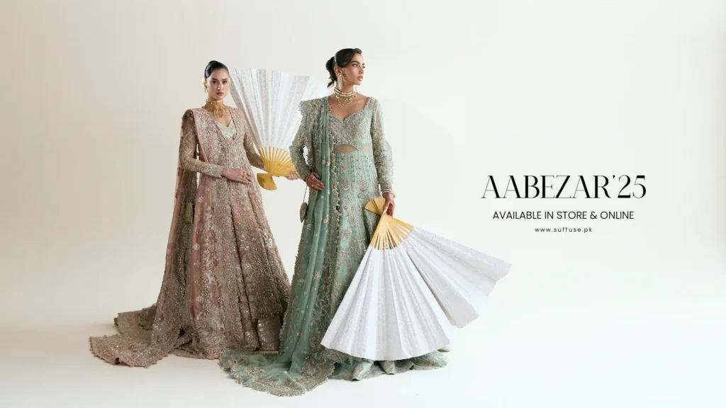 A behind-the-scenes shot of the Suffuse atelier, showing a rack of beautiful, ethereal gowns with fabrics like chiffon and organza.