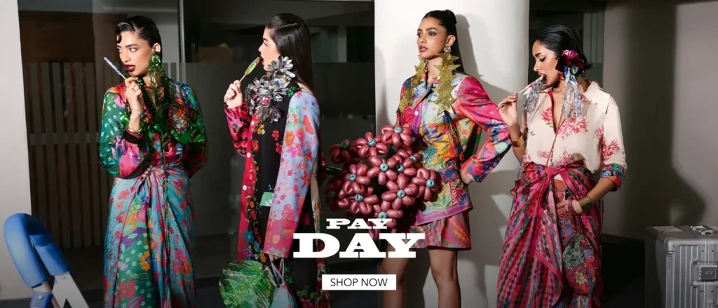 A dynamic shot from a Hussain Rehar runway show, featuring a model in a signature, brightly colored ensemble.