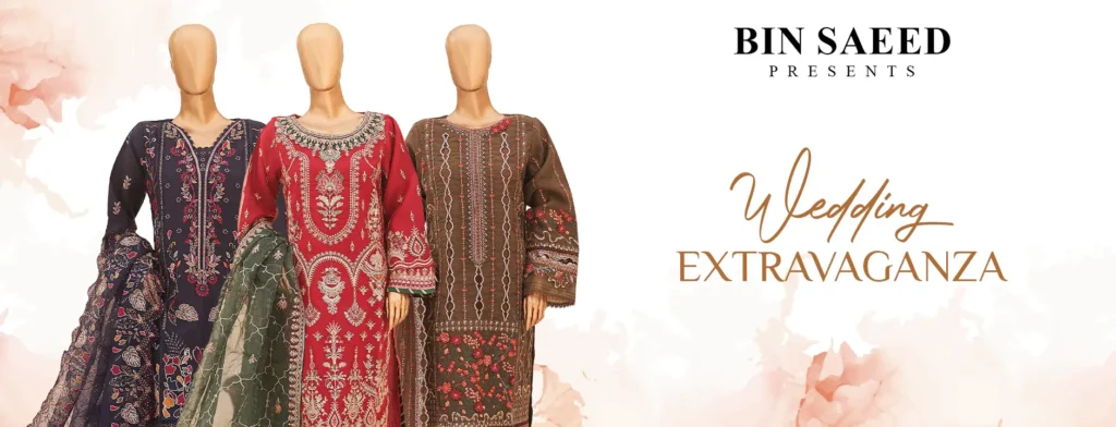 Mannequins dressed in stylish Bin Saeed outfits featuring unique prints and luxurious fabrics, showcased at the entrance of a boutique.