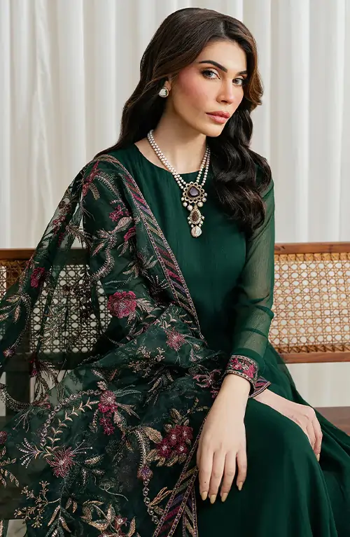 Colorful Zarif festive and formal dresses hang in a boutique, offering variety for special occasions.