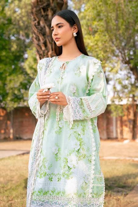 Colorful Mausummery dresses arranged neatly in a boutique.